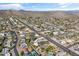 Aerial view of a neighborhood with lush landscaping, stunning mountain views, and well-maintained homes at 2366 E Shea Blvd, Phoenix, AZ 85028