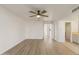This bedroom has a ceiling fan, and wood floors at 2366 E Shea Blvd, Phoenix, AZ 85028