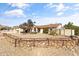 Charming single-story home with carport and unique landscaping, complete with desert plants and gravel at 2366 E Shea Blvd, Phoenix, AZ 85028