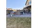 Outdoor kitchen featuring a grill, hot tub, and a grass backyard at 2825 N Villas N Ln, Chandler, AZ 85224