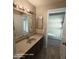 Bathroom sink with a dark wooden cabinet at 2825 N Villas N Ln, Chandler, AZ 85224