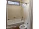 Bright bathroom featuring a shower-over-tub and a standard toilet at 2825 N Villas N Ln, Chandler, AZ 85224