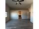 This bedroom features wood look flooring, neutral walls, ceiling fan and closet at 2825 N Villas N Ln, Chandler, AZ 85224
