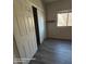 An empty bedroom featuring wood floors and a closet at 2825 N Villas N Ln, Chandler, AZ 85224