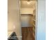 Spacious walk-in closet with built in shelving and ample storage space at 2825 N Villas N Ln, Chandler, AZ 85224