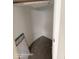 Empty closet with shelves and gray carpet at 2825 N Villas N Ln, Chandler, AZ 85224