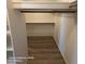 Spacious walk-in closet with built in shelving and ample storage space at 2825 N Villas N Ln, Chandler, AZ 85224