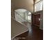 View of the entryway showcases an arched entry, staircase, and wood flooring at 2825 N Villas N Ln, Chandler, AZ 85224
