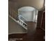 Spacious entryway with stairs, open layout, and wood flooring leading to living spaces at 2825 N Villas N Ln, Chandler, AZ 85224