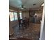 Eat-in kitchen with stainless steel refrigerator, tile floors, and natural light at 2825 N Villas N Ln, Chandler, AZ 85224