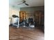 Inviting living room with fireplace, built-in shelves, and wood floors at 2825 N Villas N Ln, Chandler, AZ 85224