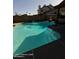 Beautiful backyard pool with sparkling water surrounded by patio space and fencing at 2825 N Villas N Ln, Chandler, AZ 85224
