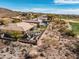 Expansive backyard with pergola, pool, and landscaped areas, offering a desert oasis at 3045 W Feather Sound Dr, Anthem, AZ 85086