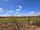 Expansive backyard view overlooking a golf course, desert landscape, and upscale homes at 3045 W Feather Sound Dr, Anthem, AZ 85086
