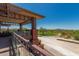 Stunning clubhouse balcony overlooking a lush golf course with mountain views at 3045 W Feather Sound Dr, Anthem, AZ 85086