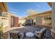 Beautiful outdoor patio with stone accents and seating, perfect for relaxation and entertaining at 3045 W Feather Sound Dr, Anthem, AZ 85086