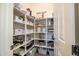 Organized pantry with custom shelving, offering plenty of storage space for kitchen essentials at 3045 W Feather Sound Dr, Anthem, AZ 85086