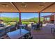 Outdoor patio area providing comfortable seating and views of the beautifully landscaped lawn at 3045 W Feather Sound Dr, Anthem, AZ 85086