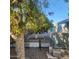 Landscaped backyard showcasing mature trees and a fenced-in area for privacy at 3160 E Main St # 72, Mesa, AZ 85213