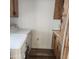 Functional laundry room equipped with a washer, dryer, and storage cabinets at 3160 E Main St # 72, Mesa, AZ 85213