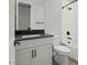 Bathroom featuring single sink vanity with modern fixtures and a shower/tub combination at 3875 E Appaloosa Rd, Gilbert, AZ 85296