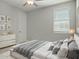 Well lit bedroom with light colored walls and lots of pillows at 3875 E Appaloosa Rd, Gilbert, AZ 85296