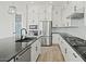 Bright kitchen featuring modern appliances, an island with sink, and plenty of counter space at 3875 E Appaloosa Rd, Gilbert, AZ 85296