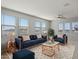 Cozy second floor living room with plush rug and ample natural light at 3875 E Appaloosa Rd, Gilbert, AZ 85296