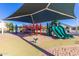 Community playground with covered play structure, slides, and climbing area at 3875 E Appaloosa Rd, Gilbert, AZ 85296