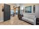 Inviting living room featuring an open floor plan, comfortable seating, and stylish decor for relaxation at 42001 N Bridlewood Way, Phoenix, AZ 85086