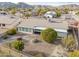 This desert landscaped backyard features privacy landscaping, and covered patio at 4401 E Walatowa St, Phoenix, AZ 85044