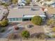 A landscaped backyard features privacy landscaping, covered patio and desert scape at 4401 E Walatowa St, Phoenix, AZ 85044