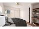 Well-lit bedroom with a sleek sliding-door closet, dedicated desk space, and modern décor at 4401 E Walatowa St, Phoenix, AZ 85044