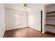 Bedroom with light flooring, window, closet and shelves at 4401 E Walatowa St, Phoenix, AZ 85044