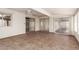 Spacious bonus room with tiled floors and sliding glass doors at 4401 E Walatowa St, Phoenix, AZ 85044