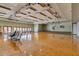 Spacious conference room with hardwood floors, projector screen, track lighting and exterior access at 4401 E Walatowa St, Phoenix, AZ 85044