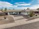 Well-maintained home with desert landscaping and a long driveway at 4401 E Walatowa St, Phoenix, AZ 85044