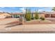 Charming single-story home featuring desert landscaping, including cacti and gravel accents at 4401 E Walatowa St, Phoenix, AZ 85044