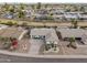 This aerial view showcases the front yard with mature landscaping in a desert environment at 4401 E Walatowa St, Phoenix, AZ 85044