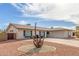 Single-story home featuring desert landscaping and two-car garage at 4401 E Walatowa St, Phoenix, AZ 85044