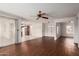 Spacious living room featuring wood-look floors and bright lighting at 4401 E Walatowa St, Phoenix, AZ 85044