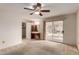 Spacious main bedroom with vanity, closet and sliding door access to a patio at 4401 E Walatowa St, Phoenix, AZ 85044