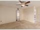 Bedroom featuring neutral walls, carpet floors, and ceiling fan for added comfort at 4401 E Walatowa St, Phoenix, AZ 85044