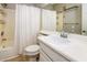 Bathroom featuring a shower-tub combo and a vanity with ample countertop space at 4465 E Paradise Village S Pkwy # 1179, Phoenix, AZ 85032