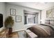 Comfortable bedroom with a decorative window nook and coordinated décor creating a serene atmosphere at 4465 E Paradise Village S Pkwy # 1179, Phoenix, AZ 85032