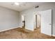 Bright bedroom with ceiling fan, carpet, and multiple closets for ample storage at 4465 E Paradise Village S Pkwy # 1179, Phoenix, AZ 85032
