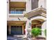 Charming townhouse with a private garage, covered entry, and desert-friendly landscaping at 4465 E Paradise Village S Pkwy # 1179, Phoenix, AZ 85032