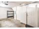 Spacious garage with ample storage space, utility hooks, and a service door at 4465 E Paradise Village S Pkwy # 1179, Phoenix, AZ 85032