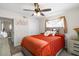 Well-lit bedroom with ceiling fan, bright natural light and neutral tones at 5014 W Gardenia Ave, Glendale, AZ 85301