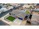 Aerial view of a single-story home with gravel landscaping, backyard pool, and boat parking at 502 N 110Th St, Mesa, AZ 85207